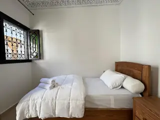 Le lit et ses coussins
